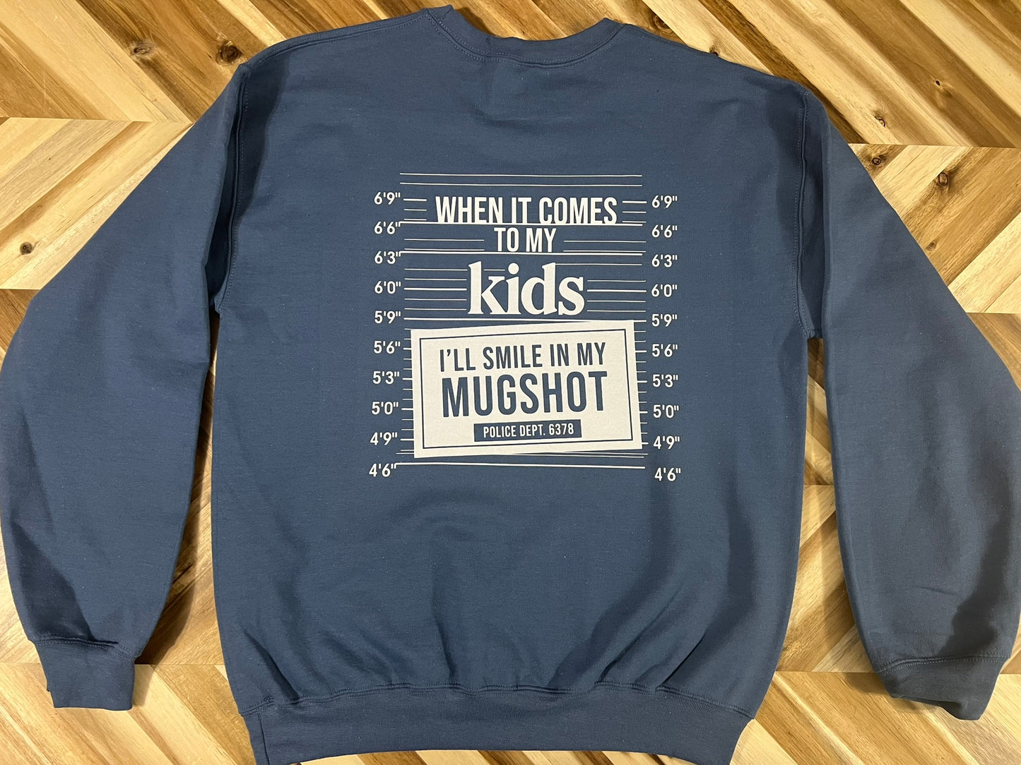When it comes to my kids, I’ll smile in my mugshot Crewneck sweatshirt