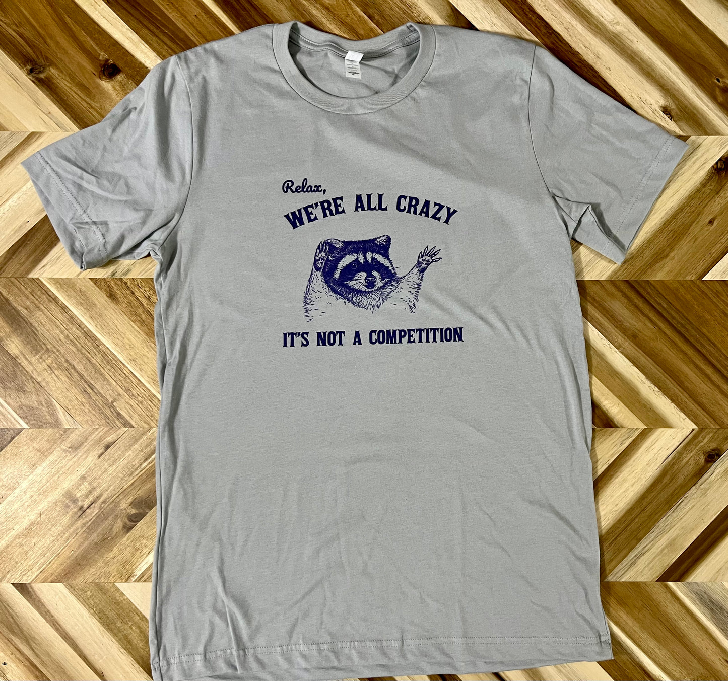 Relax, We're all crazy It's not a competition raccoon tee shirt