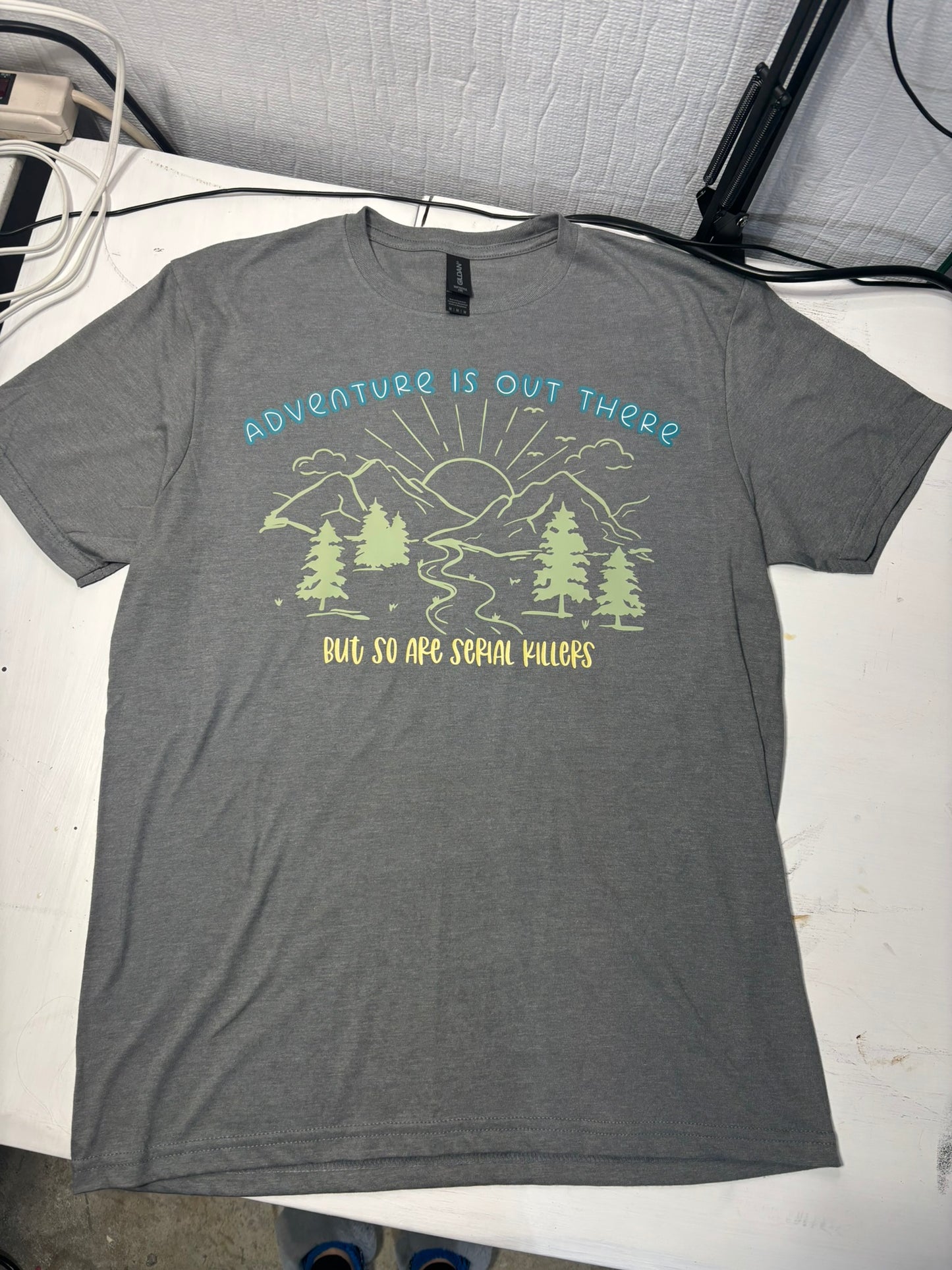 Adventure is out there, but so are serial killers t-shirt