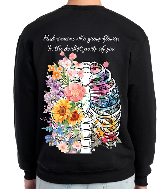 Find someone who grows flowers in the darkest parts of you crewneck sweatshirt
